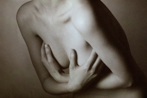 holding breast